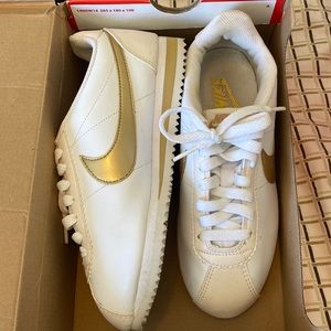 Women’s white and gold leather Cortez